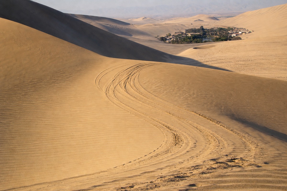 Dune buggy tracks on the sand dunes near Huacachina