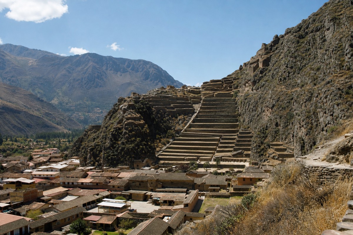 Steep Inca agricultural terraces climbing the hillside above Ollantaytambo